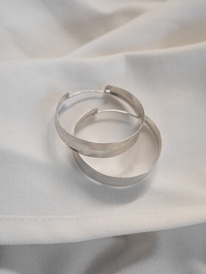 SILVER SMALL CURVED HOOPS - La Casa by Importante